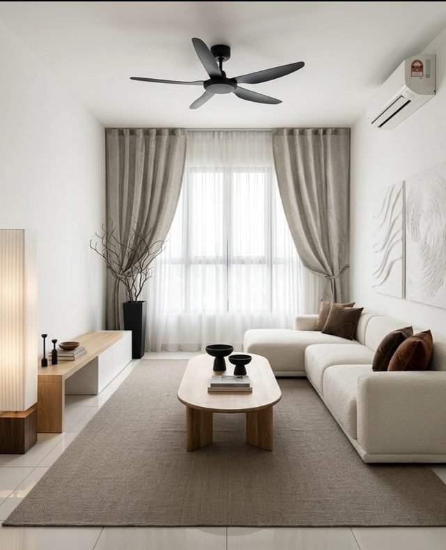 Japandi living room in a KL rental condo — low oak sofa, paper-shade floor lamp and warm neutral walls